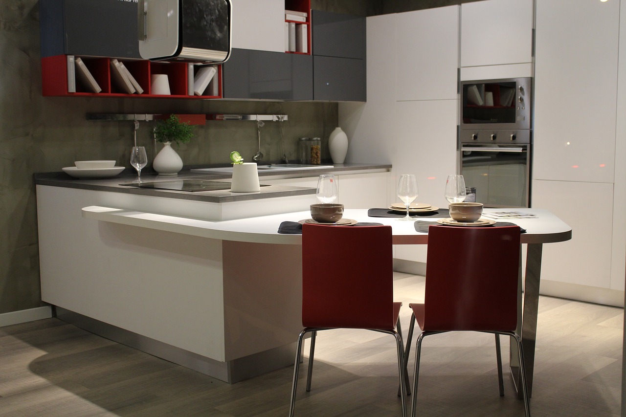 modern kitch with two red chairs